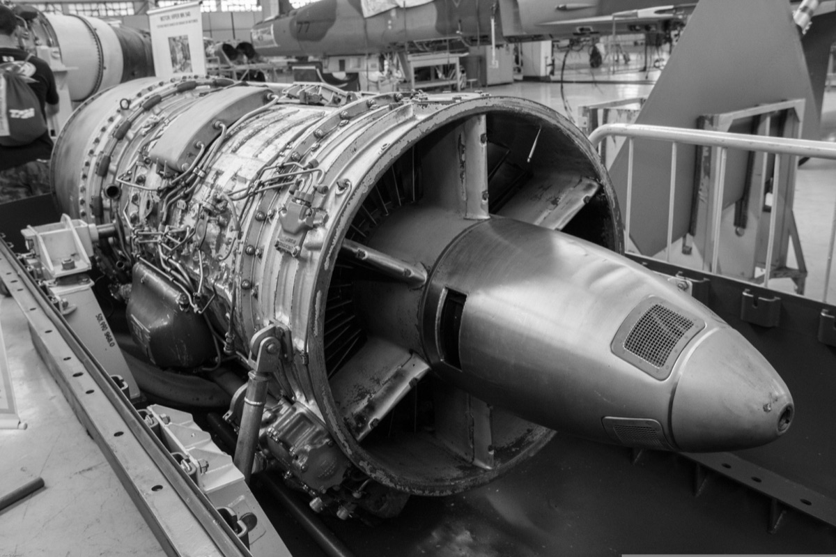 Jet engine on display in an aircraft hangar